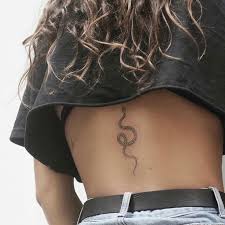 Female tattoo on the back