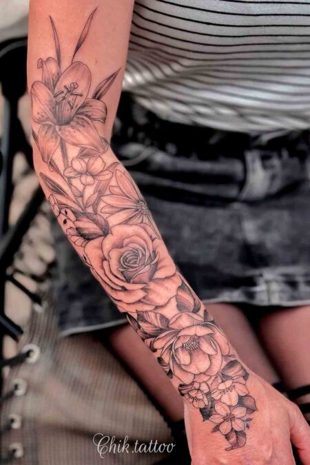 tatuagem-feminina-braco-fechado-flores