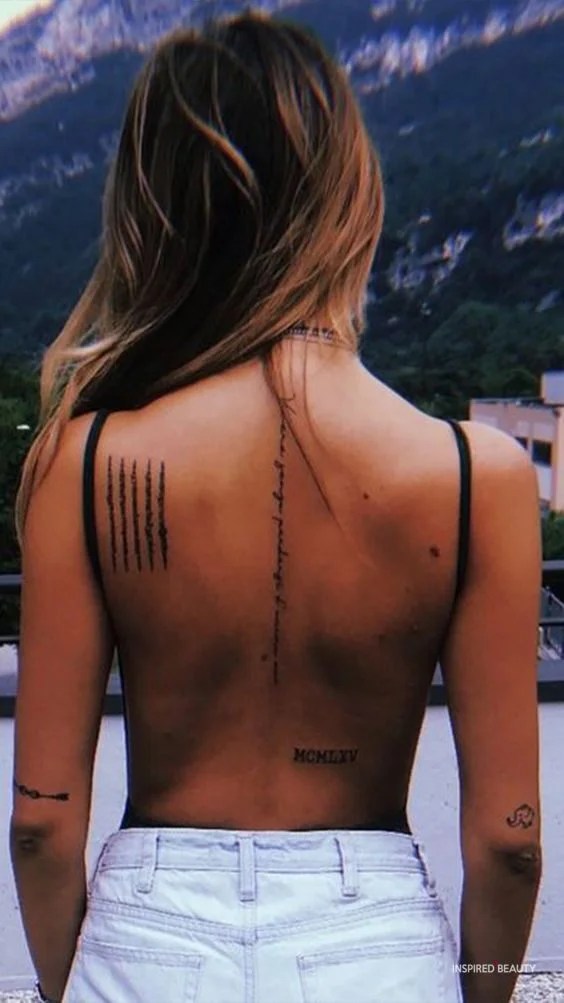 Female tattoo on the back