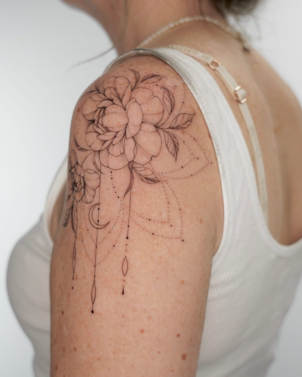 Delicate Female Tattoo On Arm