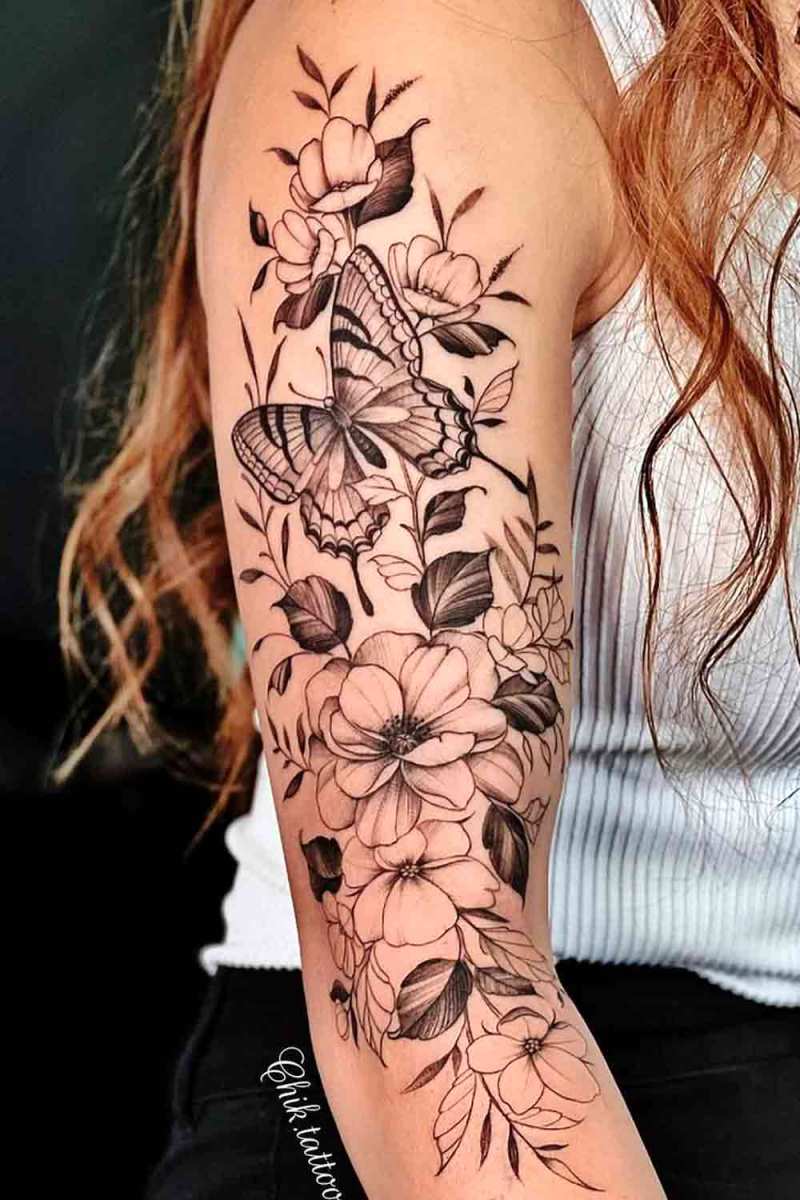 tatuagem-feminina-com-flores-no-braco