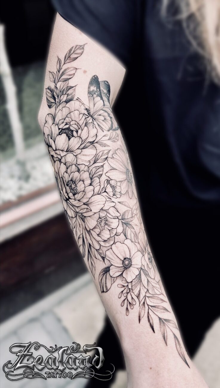 Delicate Female Tattoo On Arm