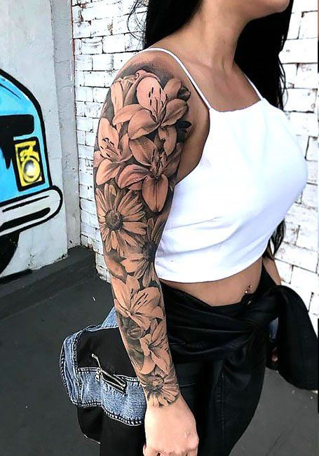 tatuagem-feminina-com-flores-no-braco