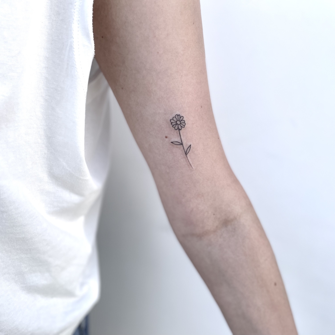 Delicate Female Tattoo On Arm