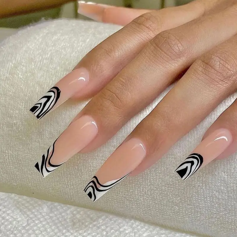 Decorated nails in black and white