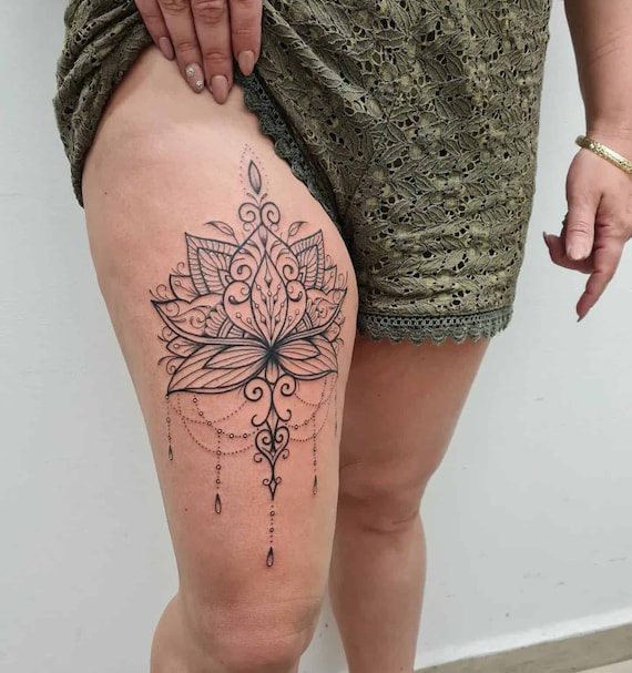 Tattoo on thigh