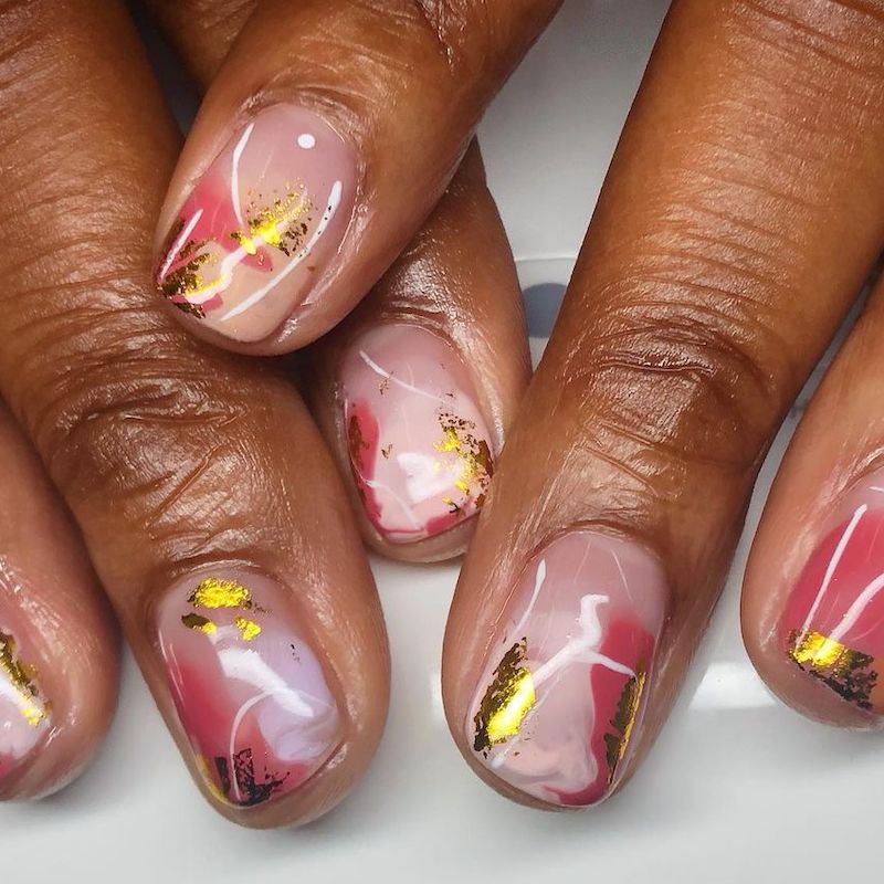 Red And Gold Decorated Nail