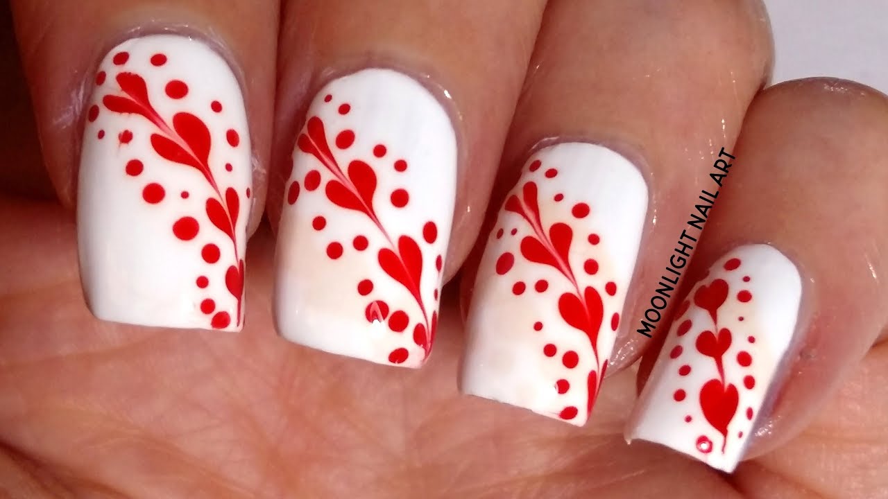 Red And White Decorated Nail