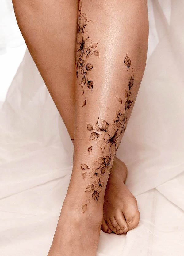 female calf tattoo