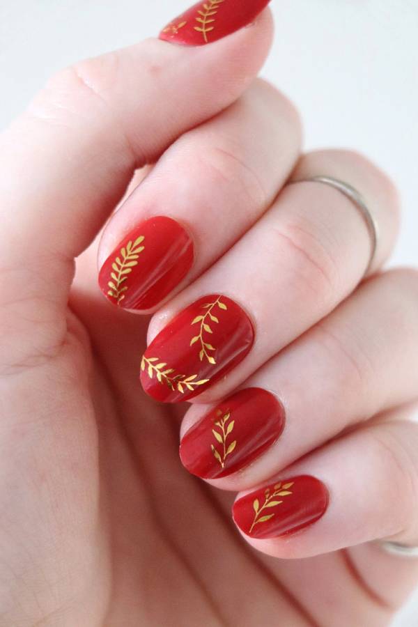 Red And Gold Decorated Nail