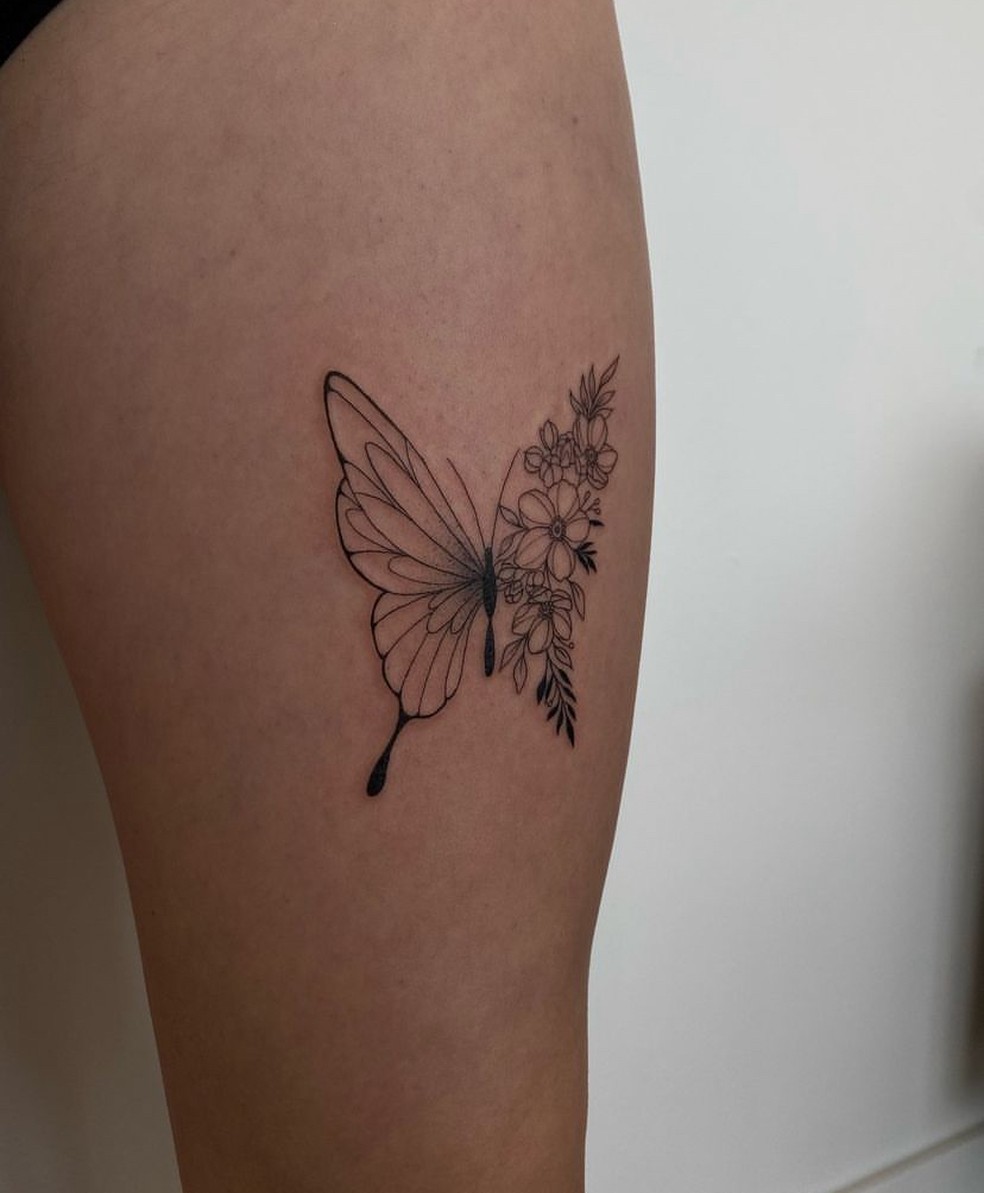 tatuagem feminina na perna