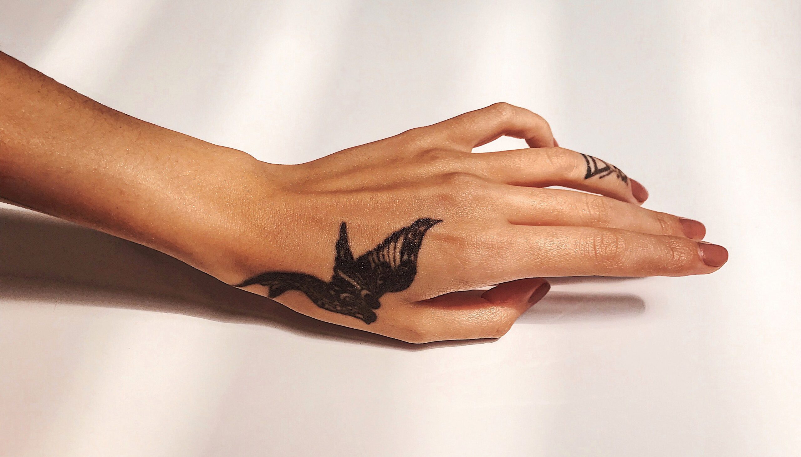 finger tattoo