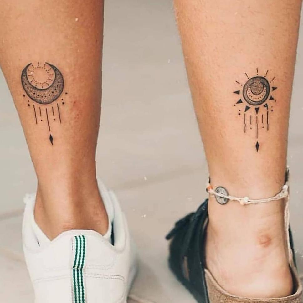 female calf tattoo