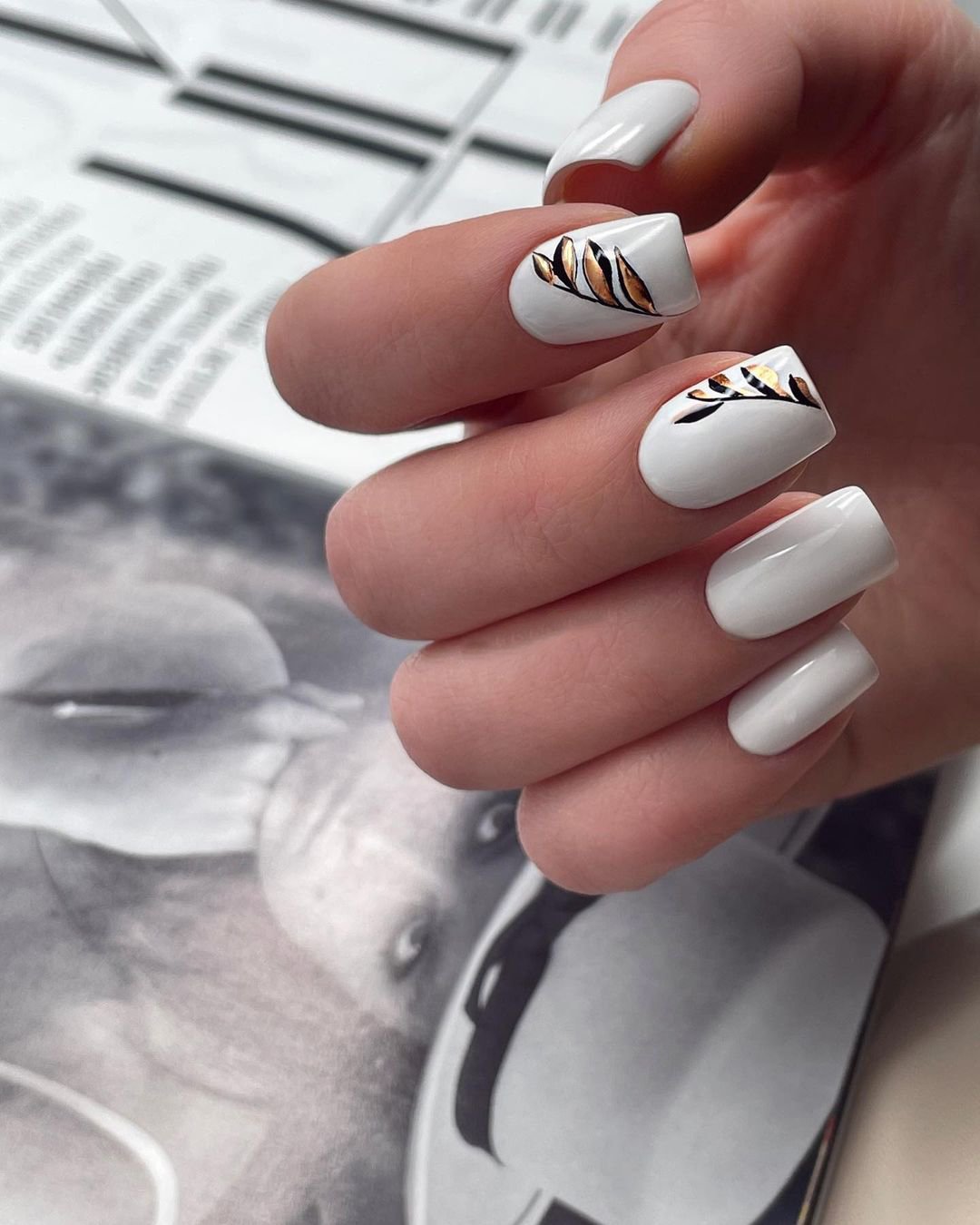 White Decorated Nail