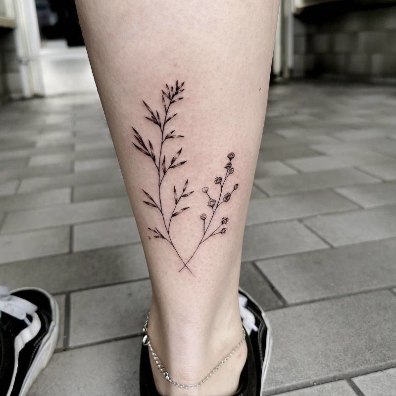 female calf tattoo