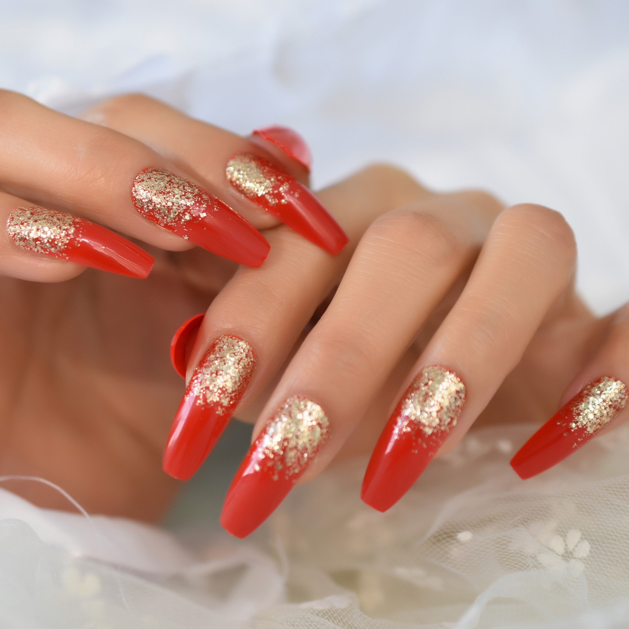 Red And Gold Decorated Nail