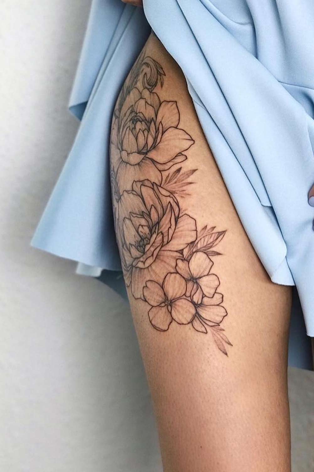 Tattoo on thigh