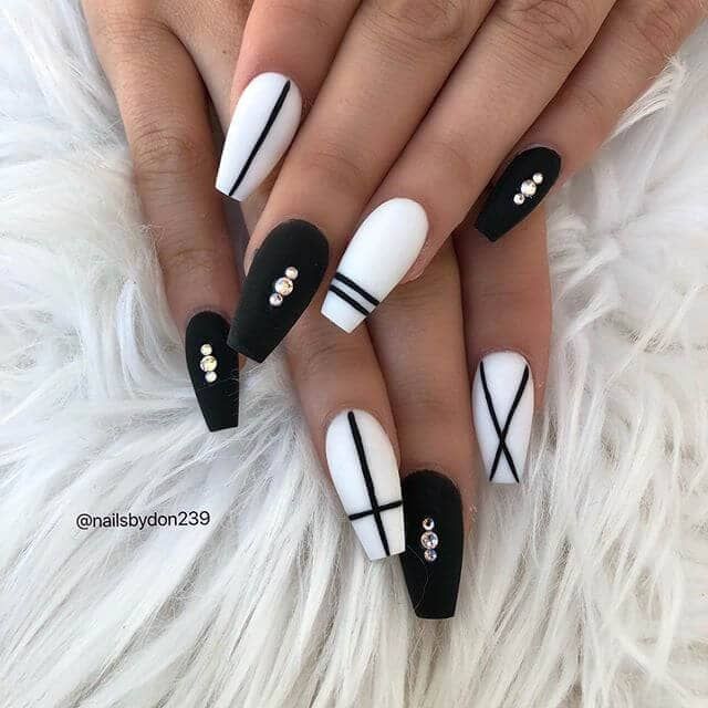 Decorated nails in black and white