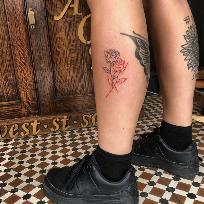 female calf tattoo