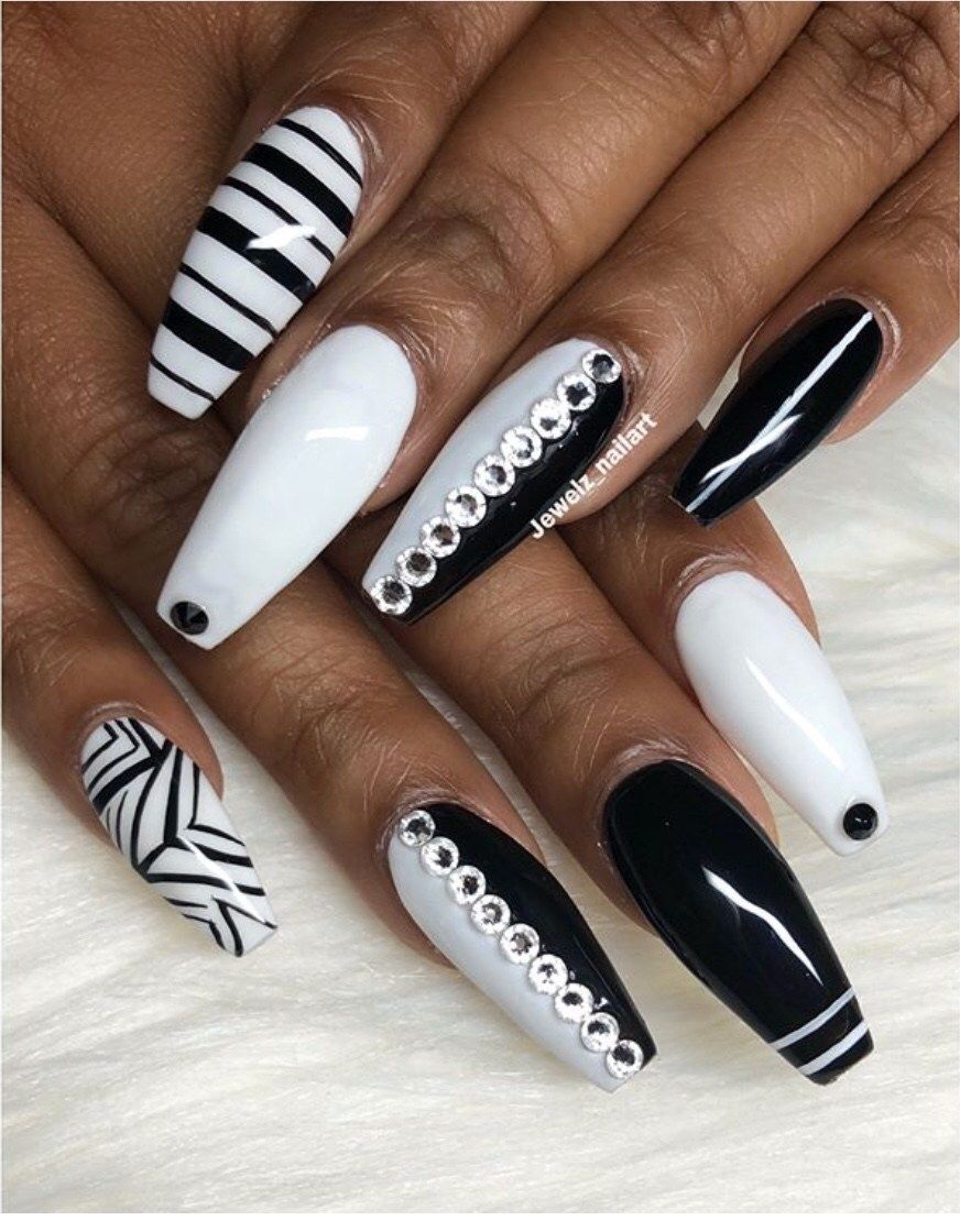 Decorated nails in black and white