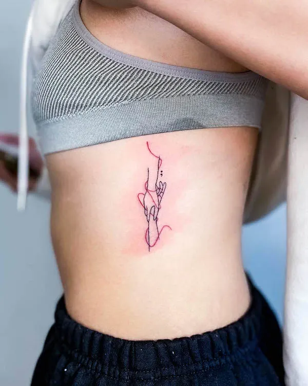 Rib Tattoo