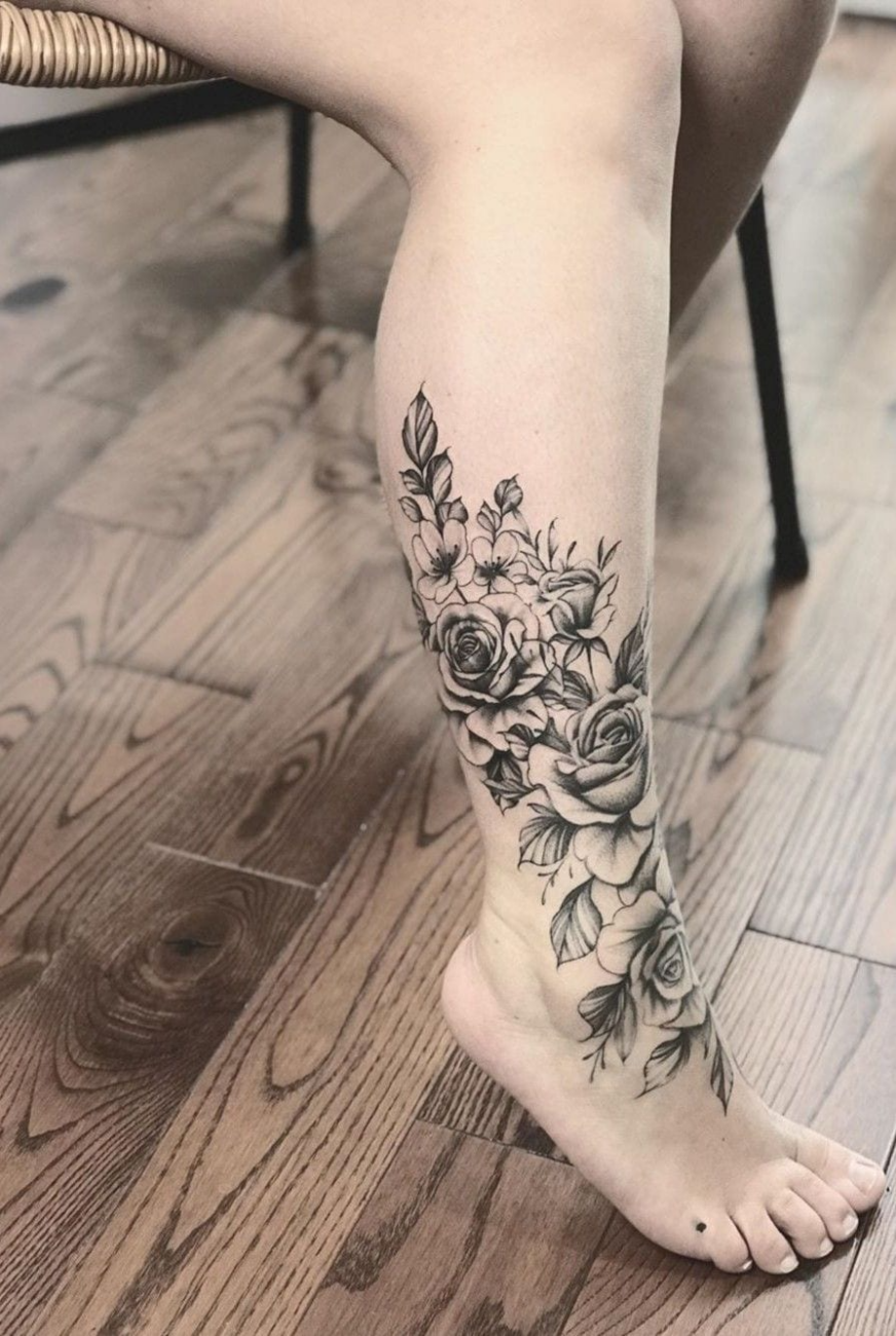 female calf tattoo