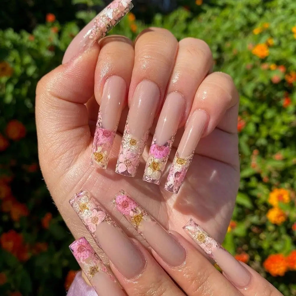 nail with encapsulated dried flower