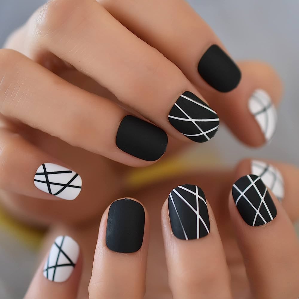 Decorated nails in black and white