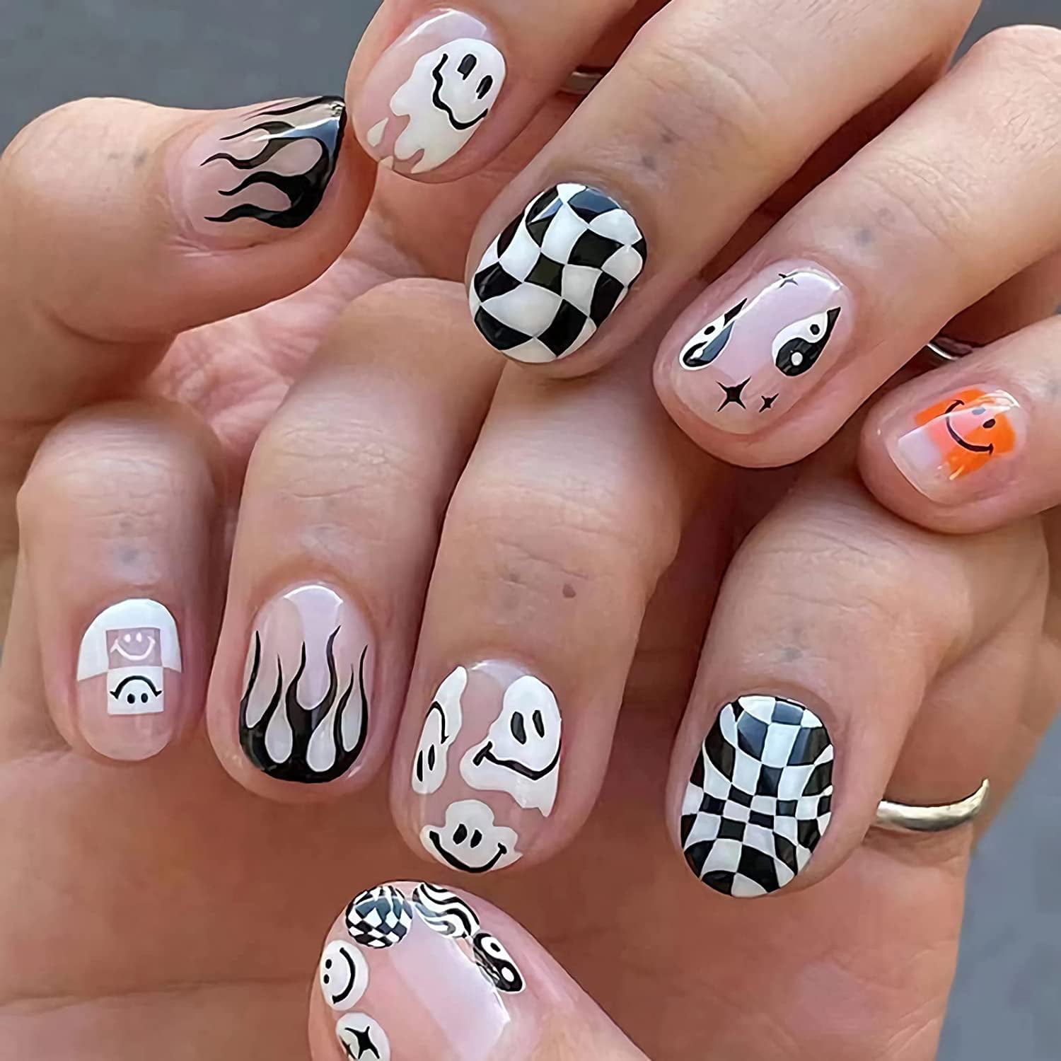 Decorated nails in black and white