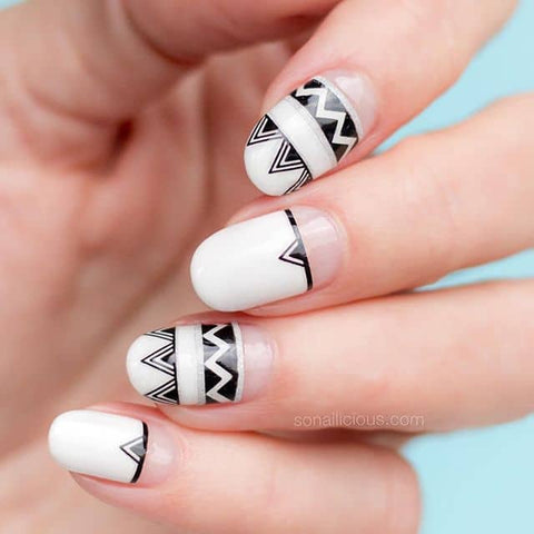 Decorated nails in black and white