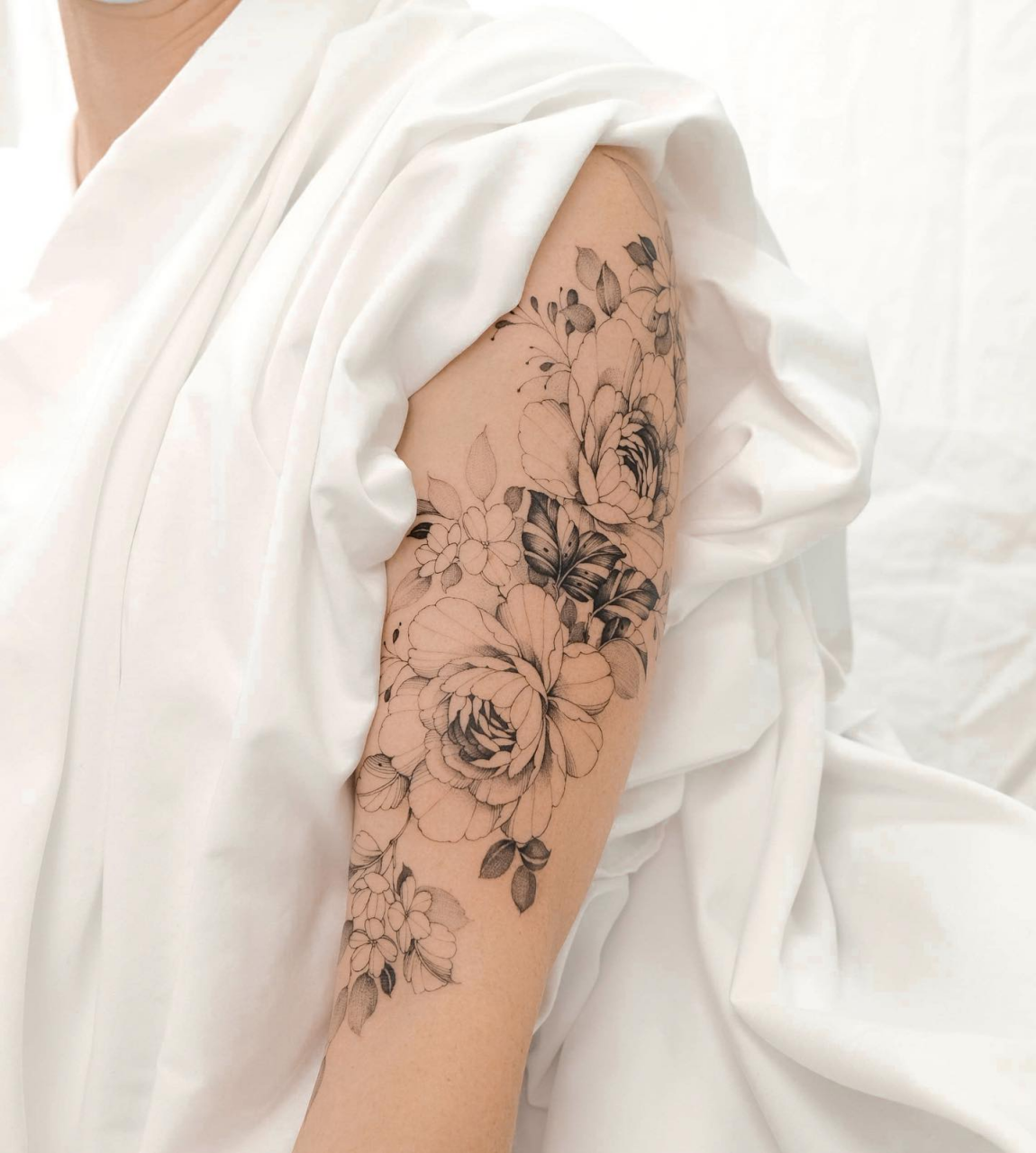 Delicate Female Tattoo On Arm