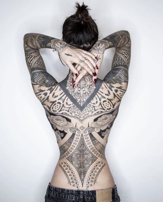 Female tattoo on the back