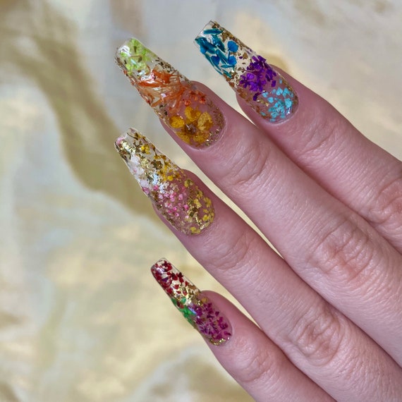 nail with encapsulated dried flower