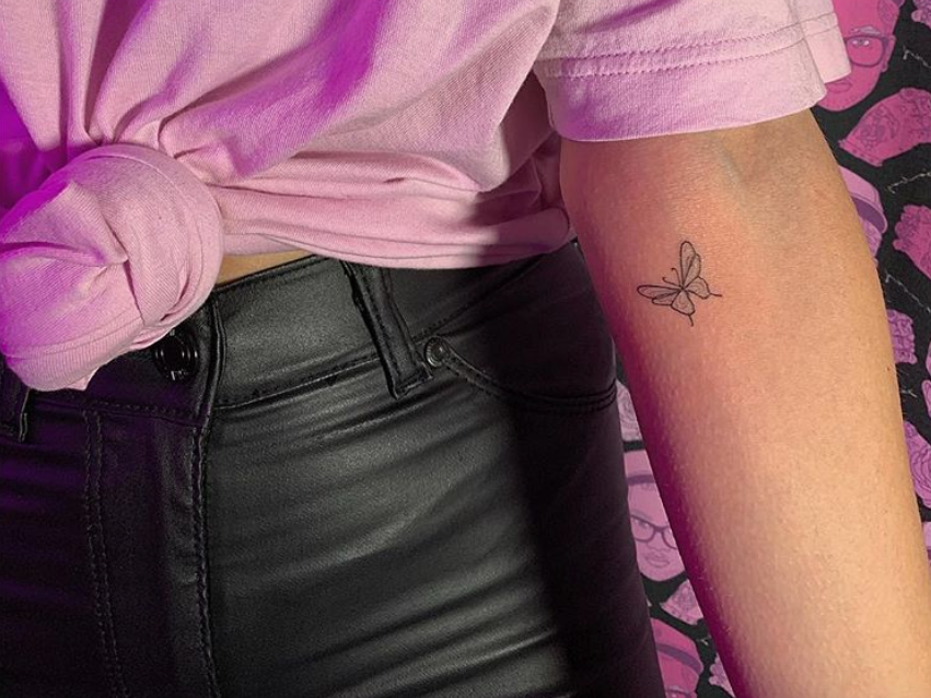 Delicate Female Tattoo On Arm