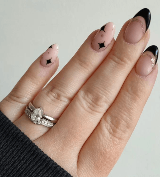 Black With Gold Decorated Nails