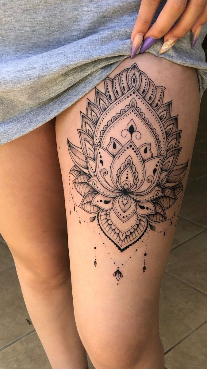 tatuagem tribal feminina na coxa